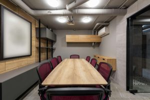 Small Workplace Conference Hall with Visible Ductwork