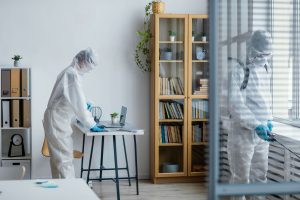 Commercial Cleaning Staff Disinfecting an Office Area